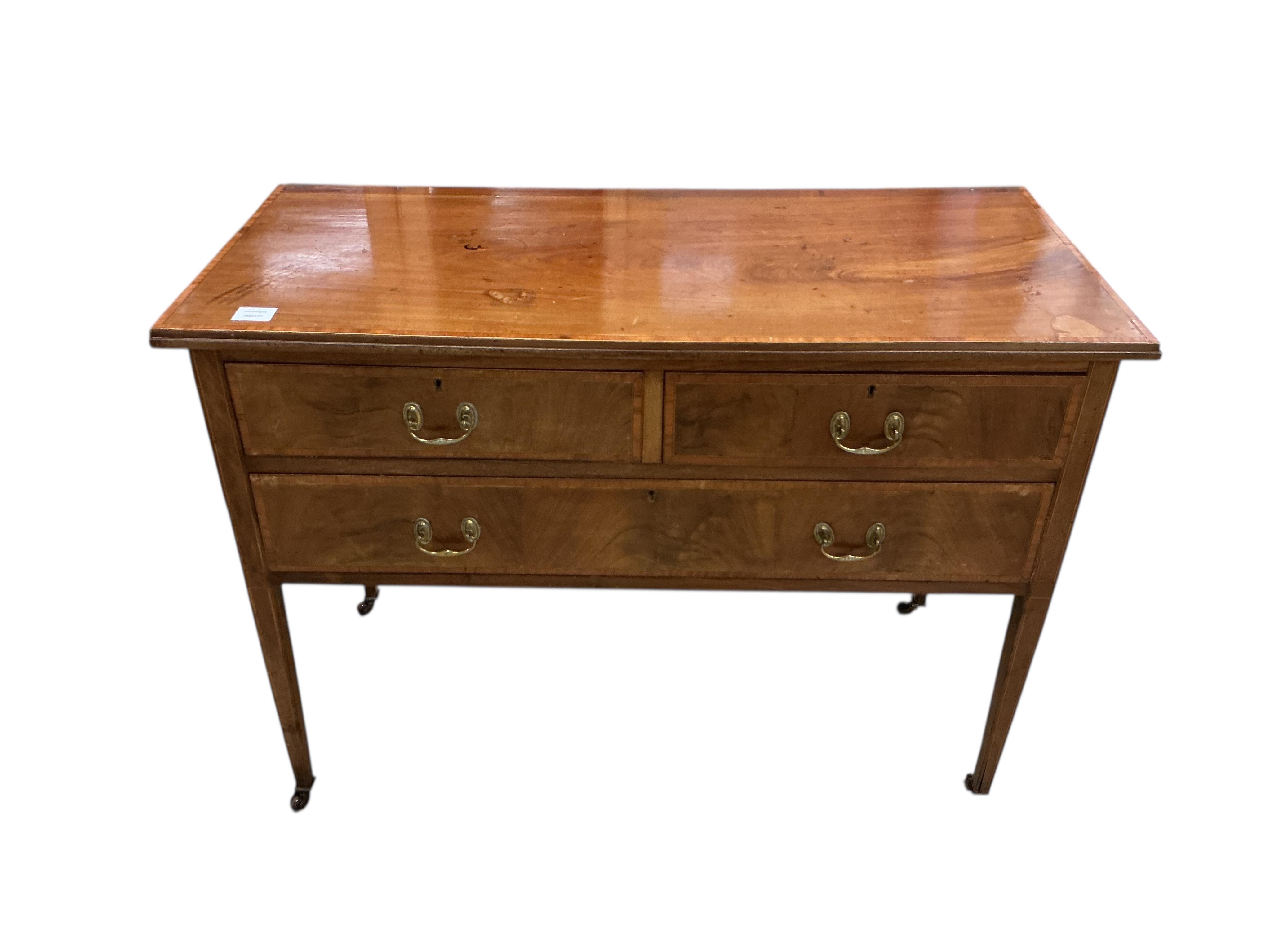 A near pair of Edwardian banded mahogany chests, each fitted with one long and two short drawers, width 107cm, depth 48cm, height 78cm